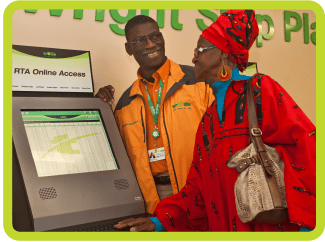 Man and woman at RTA machine